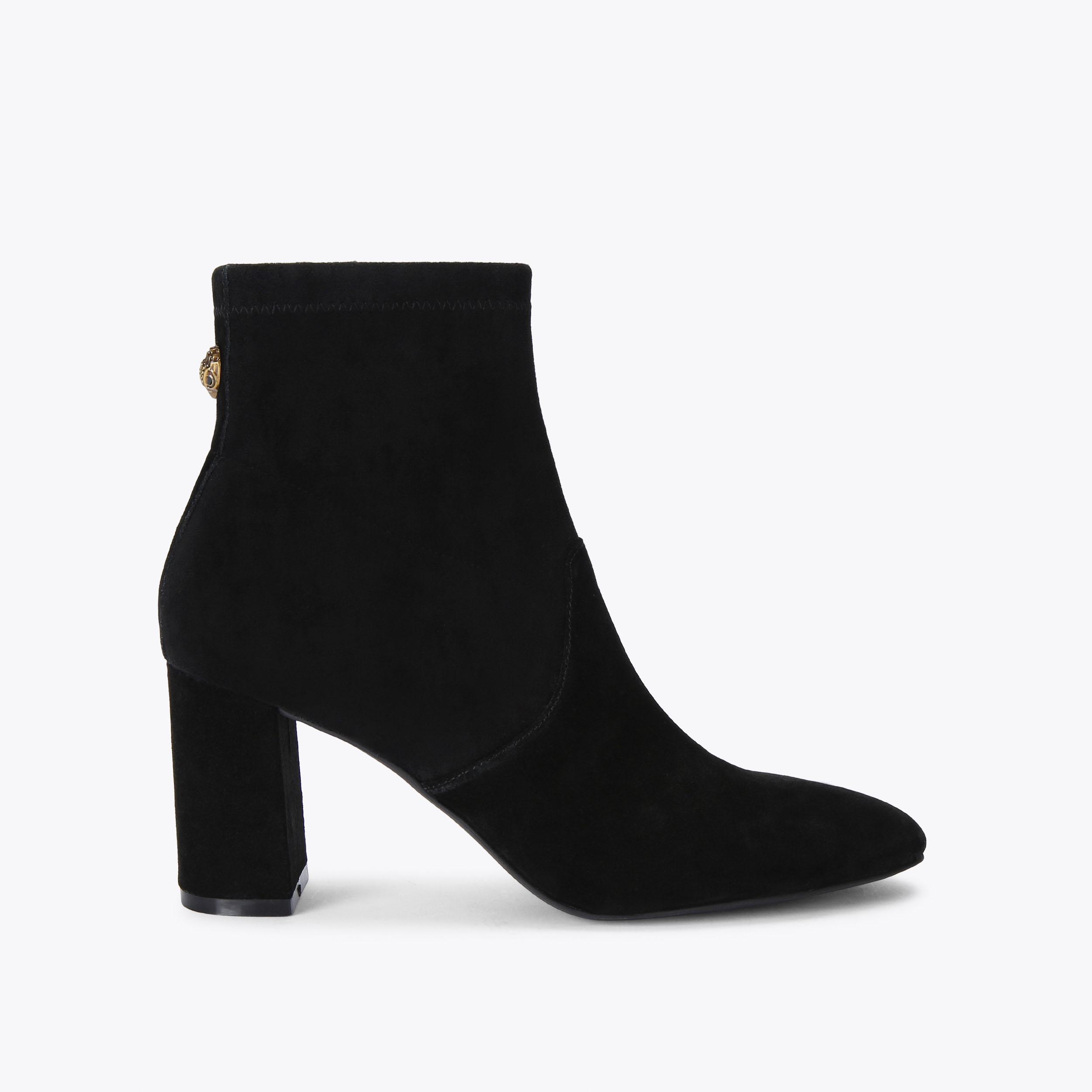 Asymmetrical black boots with an Agnus block - KeeShoes