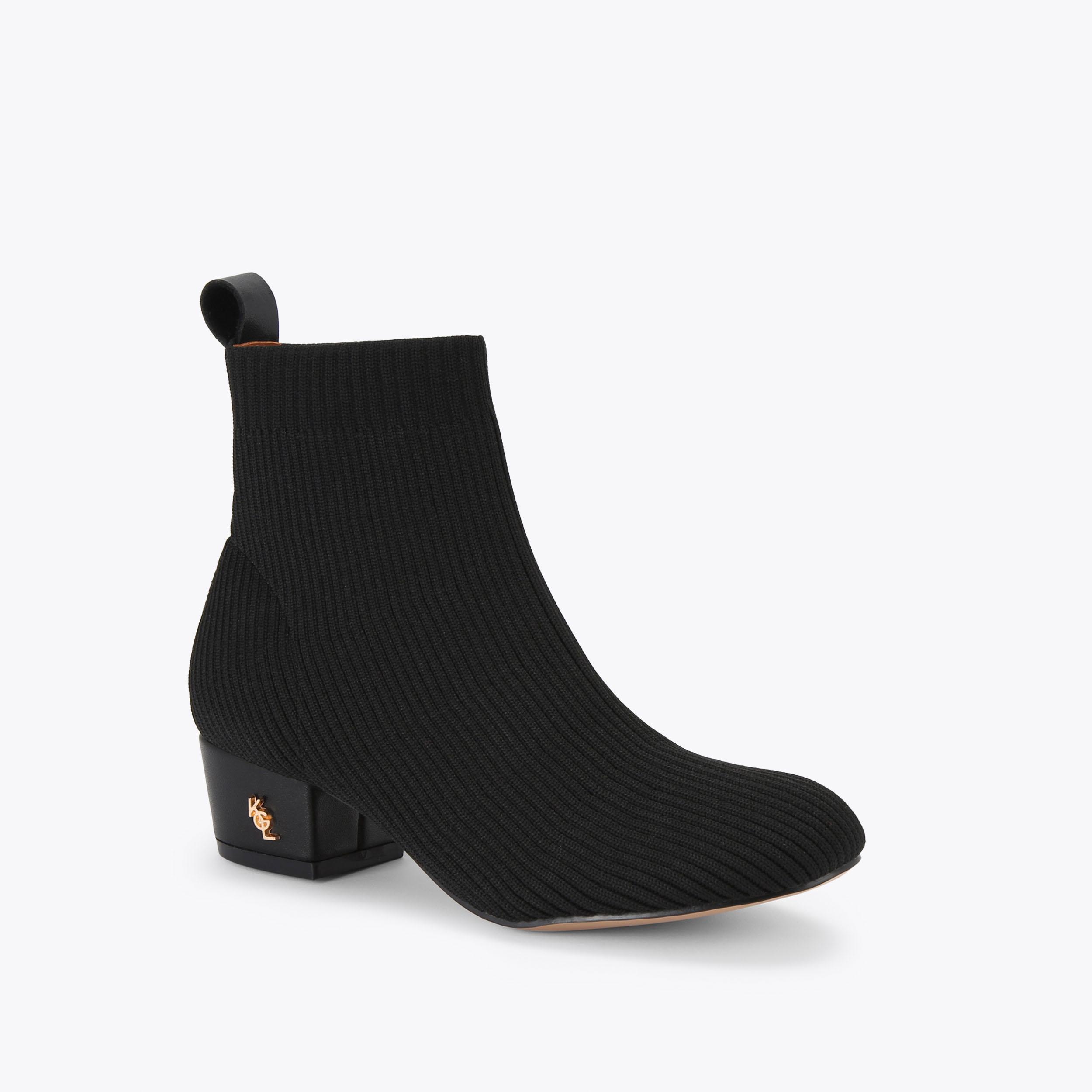 靴 YELLO NOIR MULES & LEG WARMERS 靴 YELLO NOIR MULES & LEG WARMERS YELLO / SHOOTER SNEAKER MULES