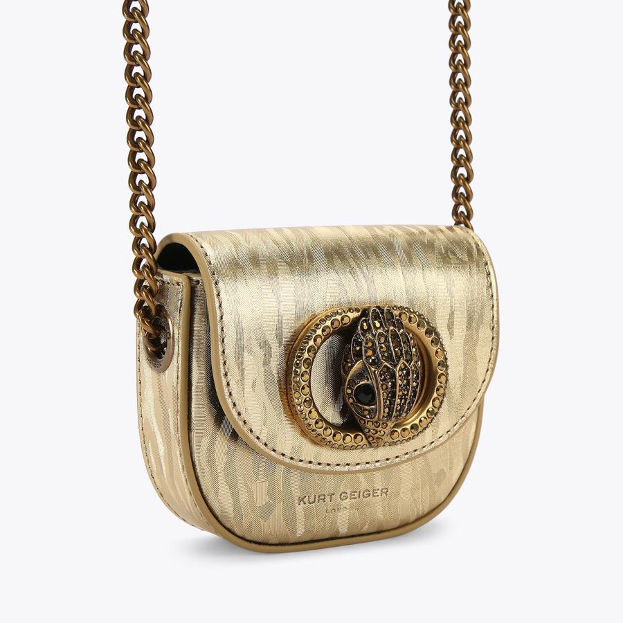 MICRO CHELSEA SADDLE Micro Gold Cross Body Bag by KURT GEIGER LONDON