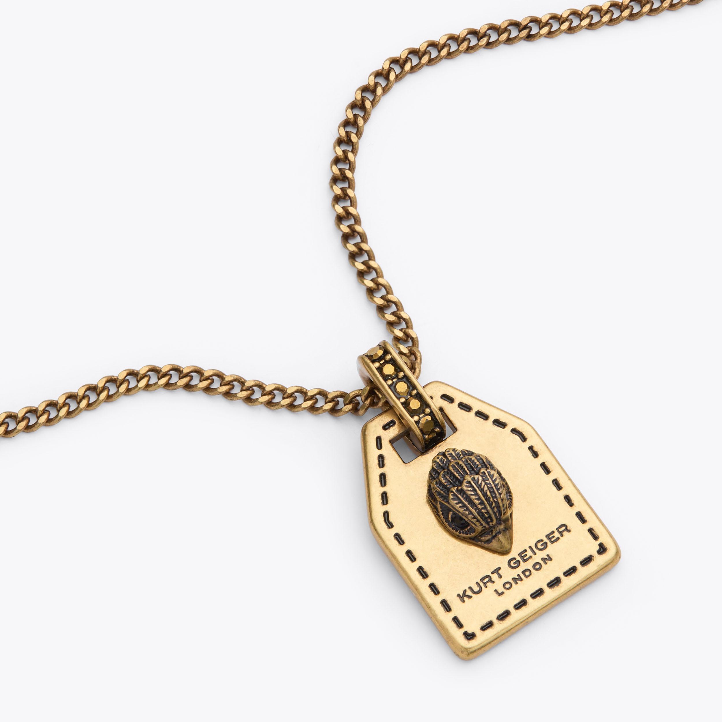 SOUTHBANK TAG PENDANT Antiqued Brass Necklace by KURT GEIGER LONDON