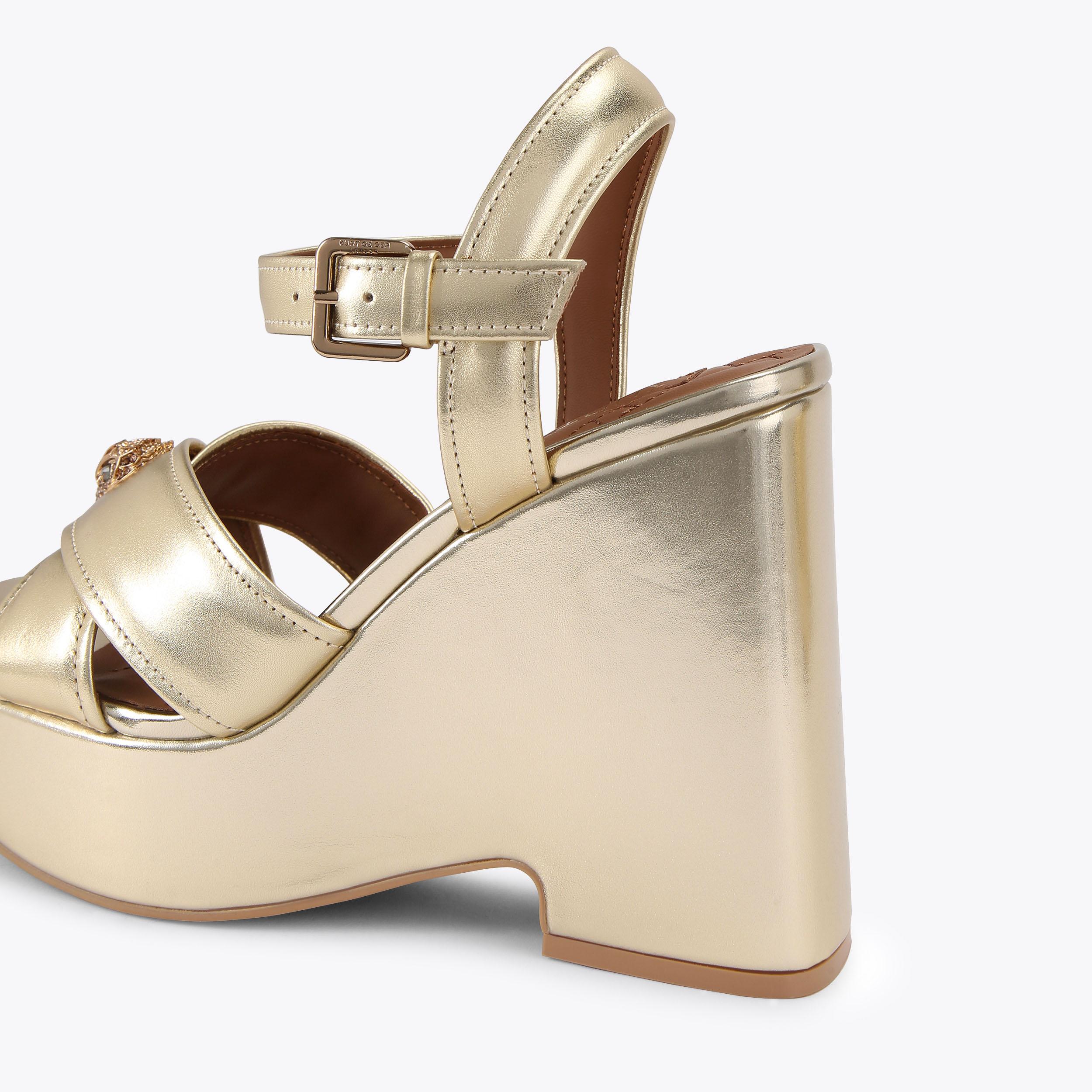 KENSINGTON CROSS WEDGE Metallic Gold Wedge Heel by KURT GEIGER LONDON
