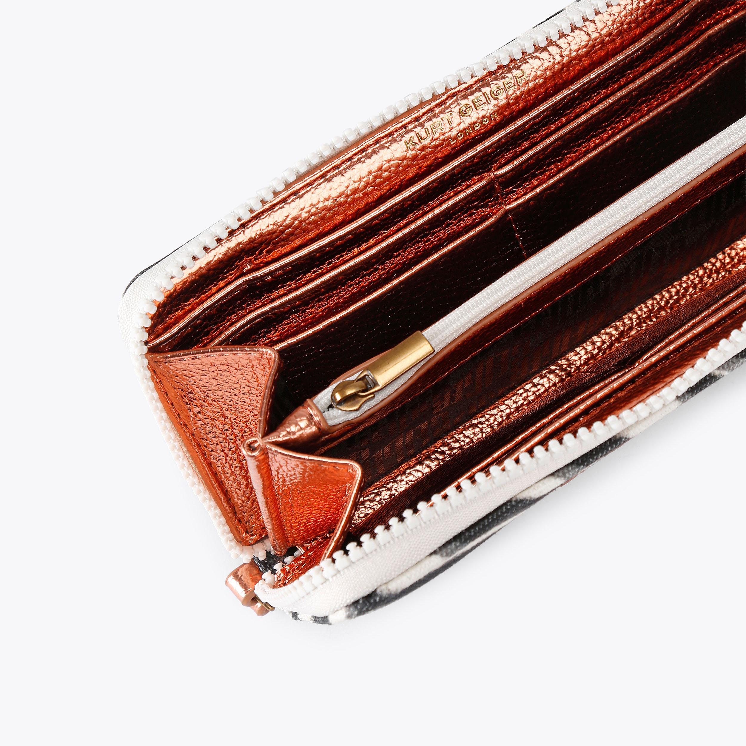 SOUTHBANK ZIP AROUND W ZEBRA ZIP AROUND WALLET by Kurt Geiger London