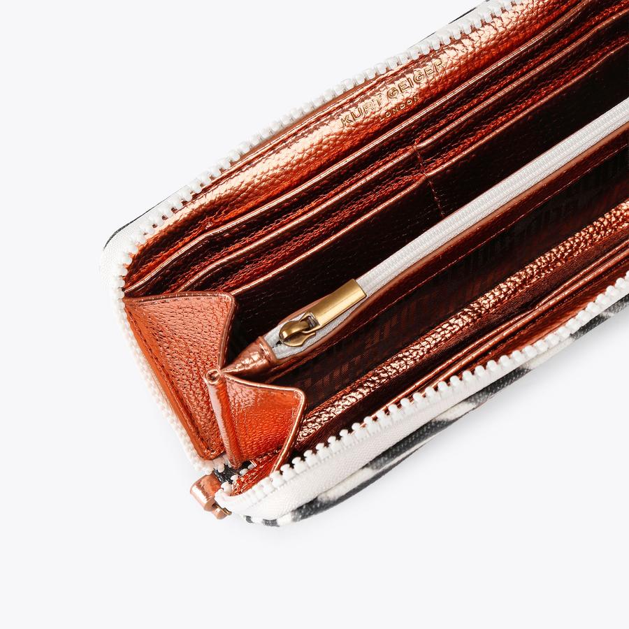 ガーネット SOUTHBANK ZIP AROUND W ZEBRA ZIP AROUND WALLET by Kurt Geiger London