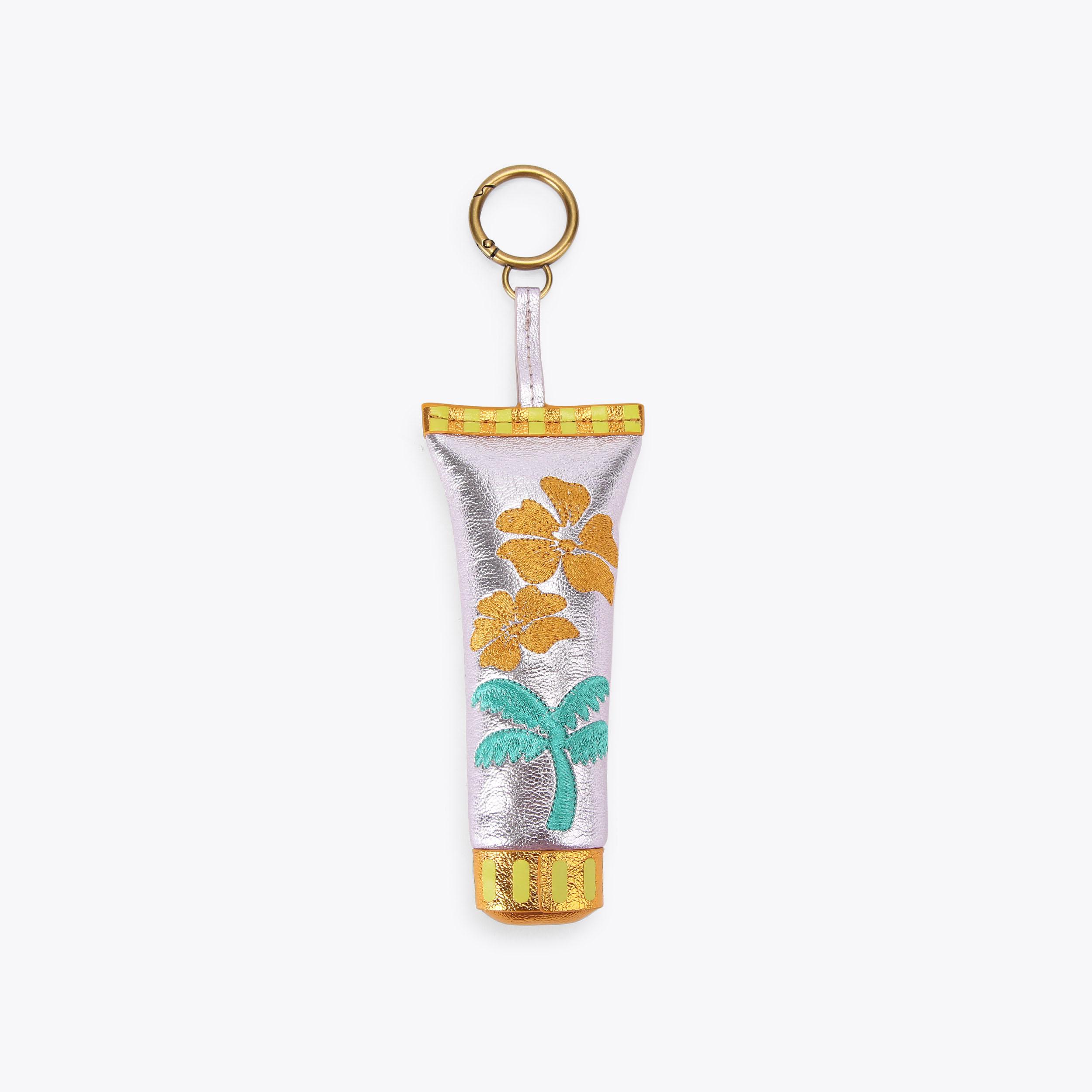 SUNSCREEN CHARM Suncream keyring Charm by Kurt Geiger London