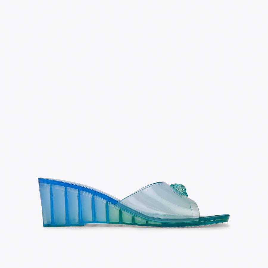 MADDISON WEDGE MULE Blue Perspex Wedge Mule by Kurt Geiger London