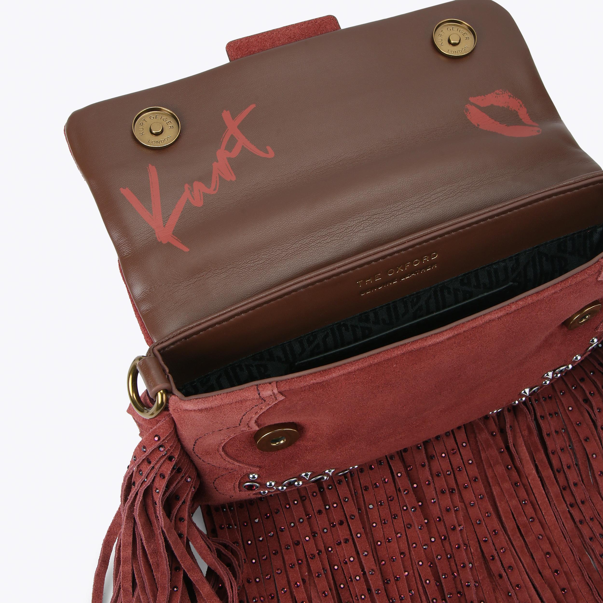 GLASTO FRINGE SHOULDER Wine Suede Shoulder Bag by Kurt Geiger London