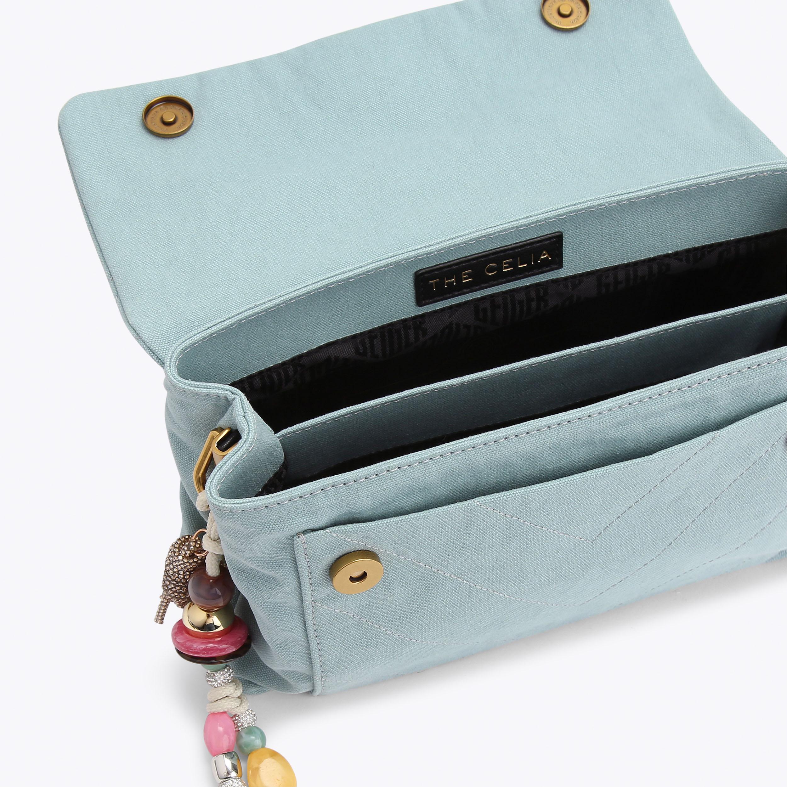 KENSINGTON XBODY Pale Blue Canvas Shoulder Bag by Kurt Geiger London