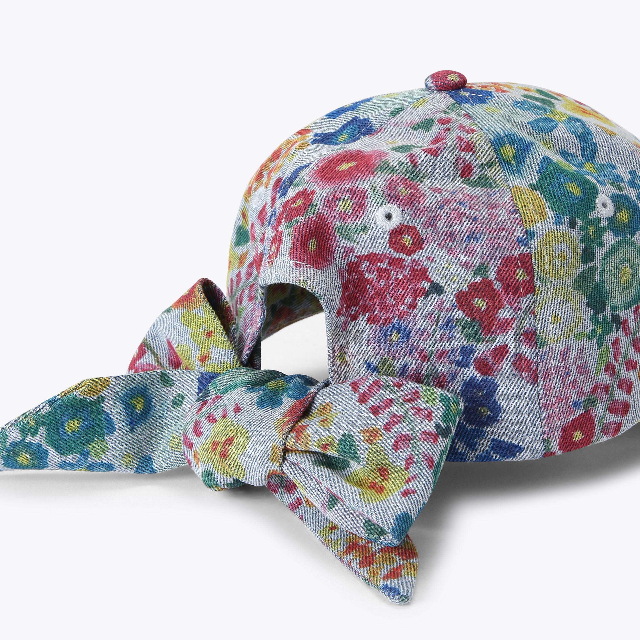KENSINGTON BOW CAP Floral Printed Cap by Kurt Geiger London