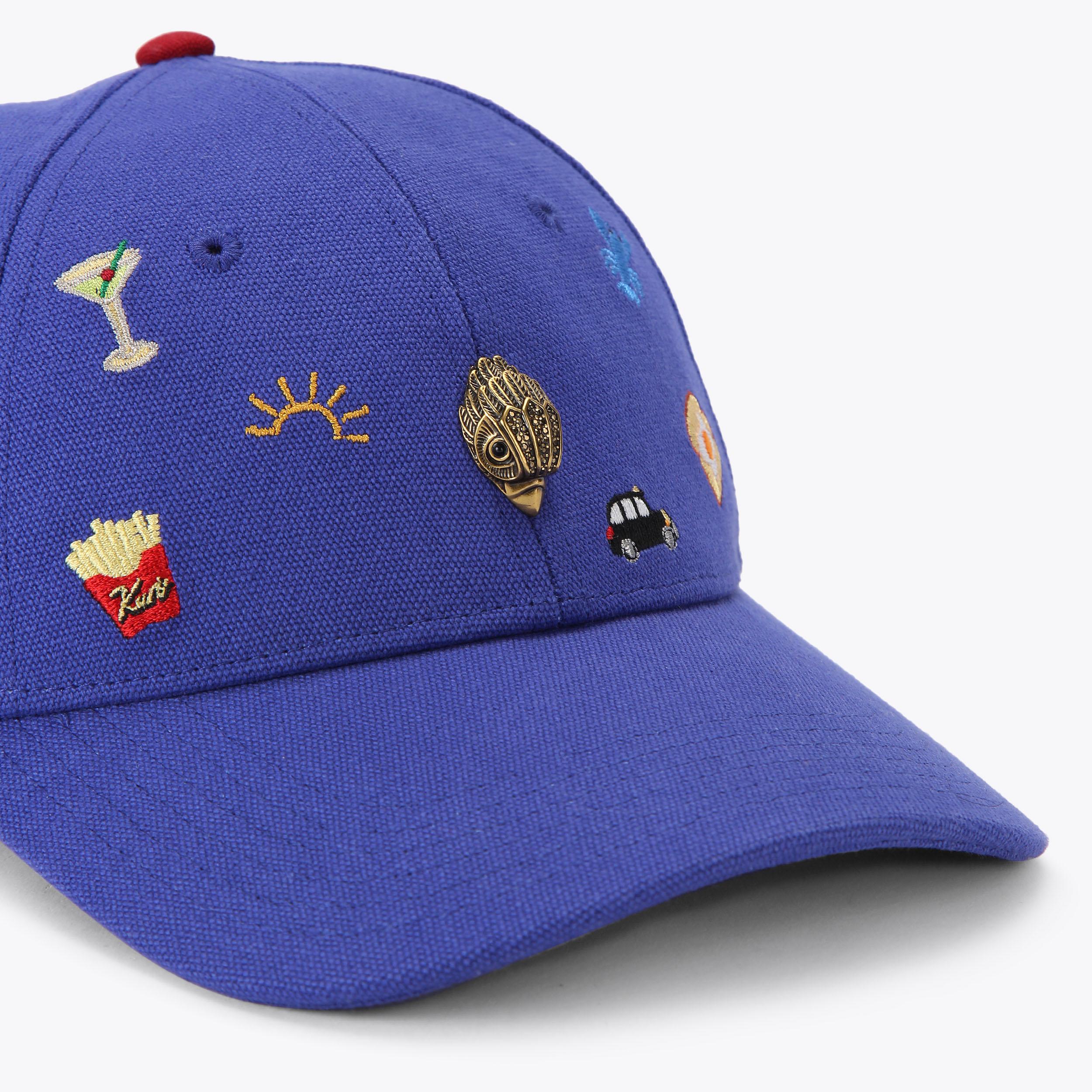 MICRO CHARMS CAP MICRO CHARMS CAP by Kurt Geiger London