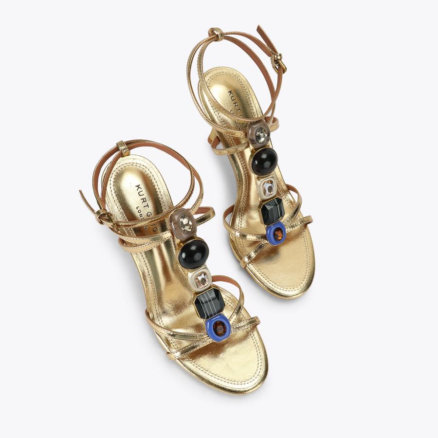 OPHELIA SANDAL Gold statement LouLou Heel crafted from a metallic