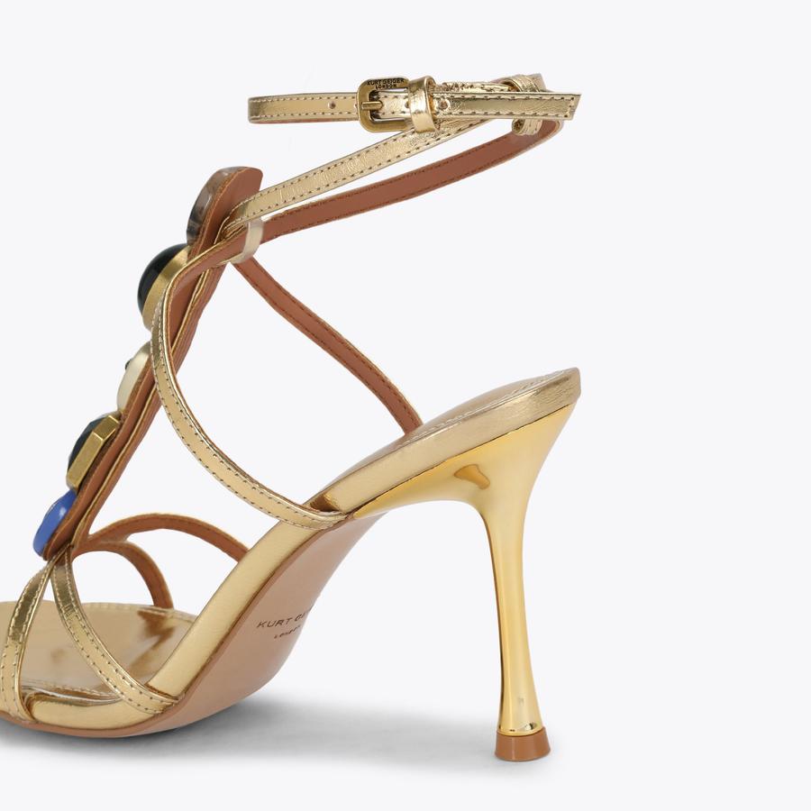 OPHELIA SANDAL Gold statement LouLou Heel crafted from a metallic