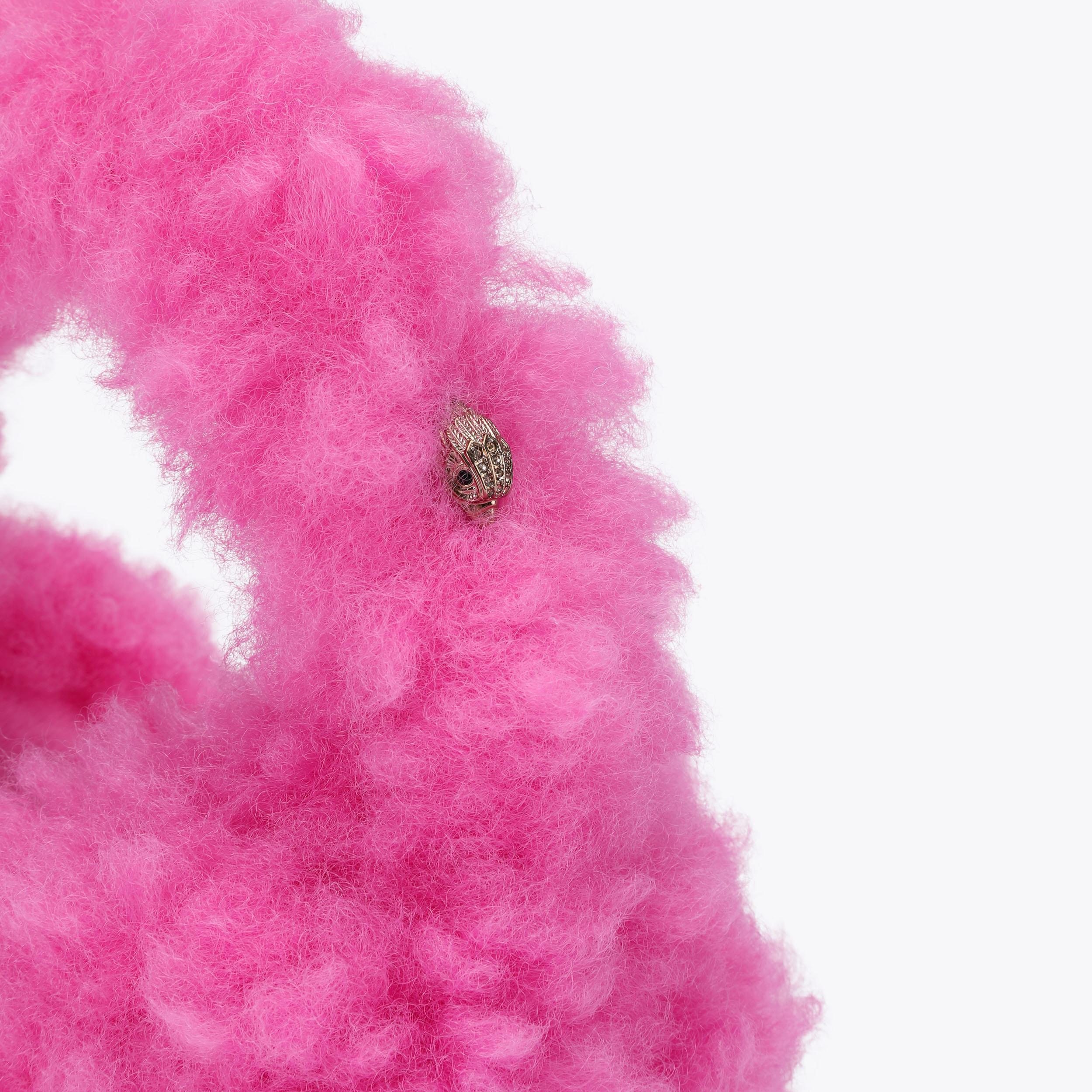 CELIA EARMUFFS Fuchsia Faux Fur Earmuffs by Kurt Geiger London