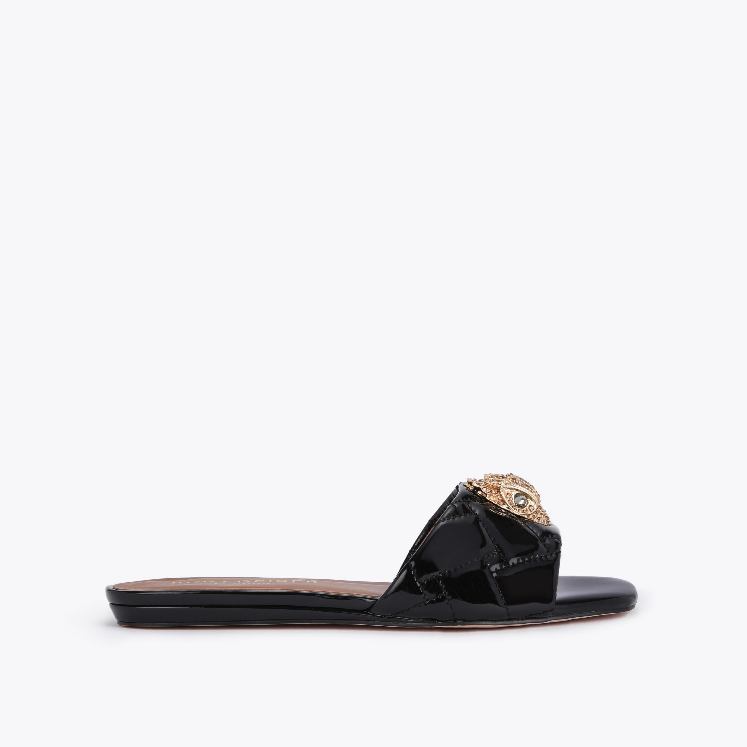 Flat patent leather sandals